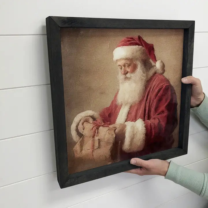 Vintage Wrapping Presents Santa Framed Art Print- 15" x 15"